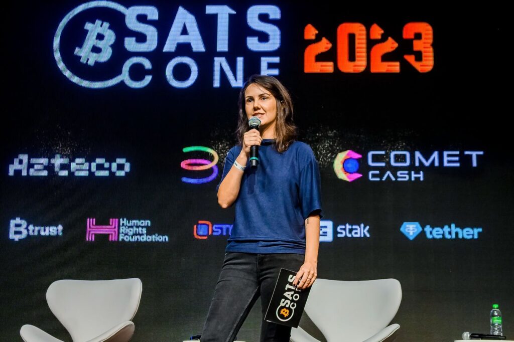 Carol Souza speaking at Satsconf 2023